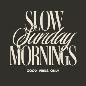 May include: A dark gray background with the words "SLOW Sunday MORNINGS" in a cream-colored, elegant font. Below, in a smaller font, it reads "GOOD VIBES ONLY". The design evokes a sense of relaxation and leisure.
