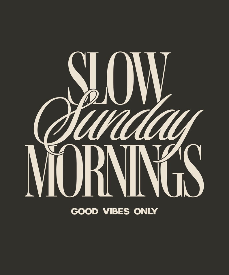 May include: A dark gray background with the words "SLOW Sunday MORNINGS" in a cream-colored, elegant font. Below, in a smaller font, it reads "GOOD VIBES ONLY". The design evokes a sense of relaxation and leisure.
