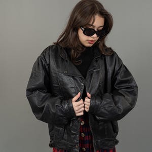 Blouson aviateur en cuir noir vintage années 80 - Coupe courte, taille M