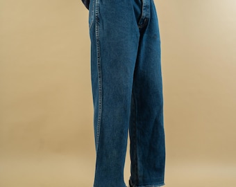 Vintage jeansy Wrangler denim niebieskie luźne spodnie casual denim neutralne pod względem płci używane rozmiar M 90. 80. y2k