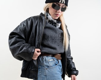 Veste de motard noire vintage des années 80 recadrée et taille veste de moto veste en cuir dur avec ceinture veste en cuir grunge esthétique y2k des années 90