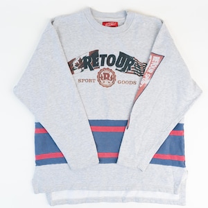 May include: Grey long-sleeved sweatshirt with a red, white and blue graphic print that says "Retour Sport" and "Sport Goods".