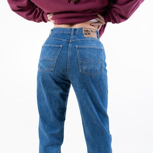 Jaren '80 vintage denim jeans broek regular fit Taille 32 Maat M lichtblauwe wassing originele jaren '80 vintage jeans genderneutraal tweedehands afbeelding 1