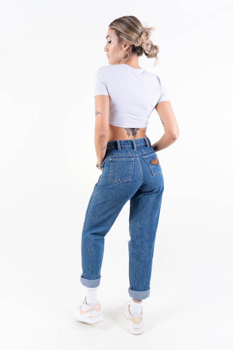 Taille M 80s vintage denim jeans pantalon coupe régulière Taille 32 bleu clair lavage original années 80 vintage image 5