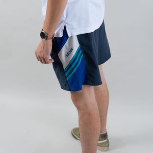 Vintage Adidas shorts blue white stripes Size M - L   80s gender neutral unisex trainings shorts track suit nona, nona clothing, vintage,  vintage online shop, gender neutral, vintage for men, vintage for woman, 80s aesthetics, 90s aesthetics,