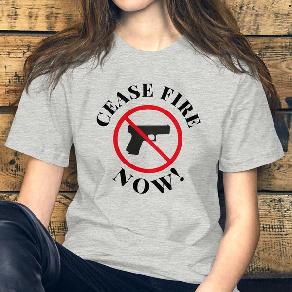 Ceasefire Now Camiseta Paz Ropa Activismo Protesta Detener la violencia Contra la guerra Moda Resolución de conflictos Conciencia global Medio ambiente
