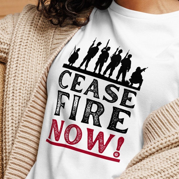 Ceasefire Now Camiseta Paz Ropa Activismo Protesta Detener la violencia Contra la guerra Moda Resolución de conflictos Conciencia global Medio ambiente