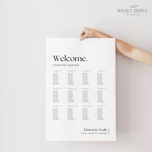 May include: A black and white wedding seating chart with the text "Welcome. Please find your seat." at the top. The chart lists 12 tables with guest names for each table. The bottom of the chart includes the text "Emma & Noah | 17.05.25 | WINCHESTER, HAMPSHIRE".