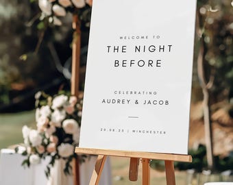 May include: White sign with black text on an easel. The sign reads "Welcome to The Night Before Celebrating Audrey & Jacob 20.08.25 | Winchester".