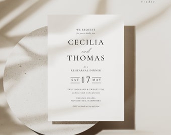 May include: A white wedding rehearsal dinner invitation with black text. The invitation reads "We request for you to kindly join Cecilia and Thomas for a rehearsal dinner Sat 17 May Two thousand and twenty five at three o'clock in the afternoon The Old Chapel Winchester, Hampshire RSVP to Sarah at 123-456-7890". The invitation also includes the text "Wildly Simple Studio" at the top.