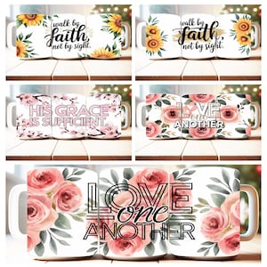May include: Set of three white ceramic mugs with floral designs and inspirational quotes. The first mug features sunflowers and the quote "walk by faith, not by sight." The second mug features pink flowers and the quote "His grace is sufficient." The third mug features pink flowers and the quote "Love one another."