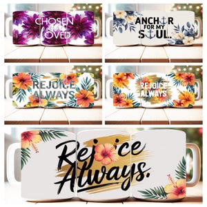 May include: Set of three white ceramic mugs with floral designs and inspirational quotes. The first mug features purple flowers and the text "Chosen and Loved". The second mug features blue flowers and the text "Anchor for my Soul". The third mug features orange flowers and the text "Rejoice Always".