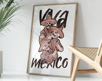 May include: A framed print with a white background and brown text that reads "Viva Mexico". The print features a cartoon illustration of three skeletons wearing sombreros and playing musical instruments.