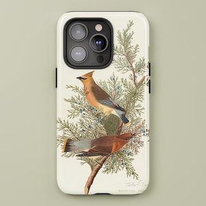 May include: A phone case featuring a vintage illustration of two Cedar Waxwing birds perched on a branch with green foliage. The birds have brown, yellow, and gray feathers. The case has the text "JARDIN BLEU VINTAGE ART".