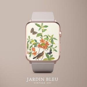 Könnte beinhalten: Eine roségoldene Smartwatch mit hellgrauem Armband. Das Zifferblatt zeigt eine Vintage-Illustration mit Vogel, Schmetterlingen und orangefarbenen Blumen. Der Text "JARDIN BLEU VINTAGE ART" befindet sich unten.