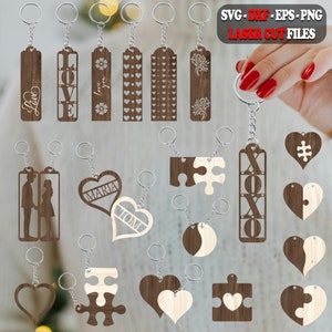 May include: A set of 15 laser cut wooden keychain designs. The designs include hearts, puzzle pieces, and words like "Love", "Home", and "XOXO".