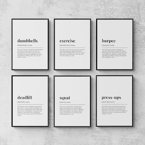 May include: Six framed prints with black frames and white backgrounds. Each print features a different workout term: dumbbells, exercise, burpee, deadlift, squat, and press-ups. Each print includes the word, pronunciation, and a definition.