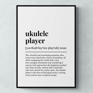 May include: Black and white printable wall art with a definition of the word "ukulele player". The definition describes the ukulele player as a cheerful and strumming sensation who turns every chord into a burst of sunshine.