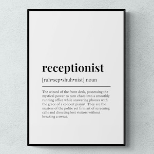 May include: A framed wall art print featuring a dictionary-style definition of the word receptionist. The text is printed in black on a white background, including the phonetic pronunciation and a humorous description of the role.
