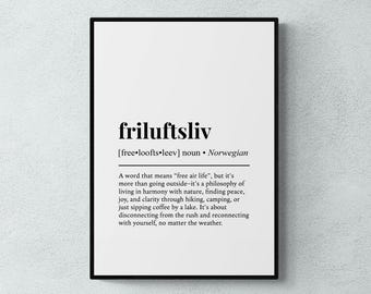 May include: A framed print with the word "friluftsliv" in a bold, black font. The definition below explains it as a Norwegian word meaning "free air life," a philosophy of living in harmony with nature. The print is on a white background.