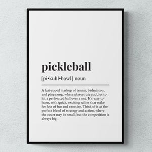 May include: Black and white printable wall art with the definition of pickleball. The definition describes pickleball as a fast-paced mashup of tennis, badminton, and table tennis.