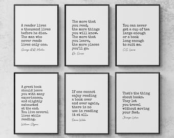 May include: Six framed art prints with black frames and white backgrounds. Each print features a quote about reading from authors like George R.R. Martin and Dr. Seuss. The quotes are in black text.