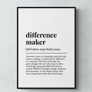 May include: A rectangular wall art print in a black frame featuring the text difference maker, the phonetic pronunciation dif-ruhns may-kuh, and a dictionary-style definition describing a person or action that creates positive change.