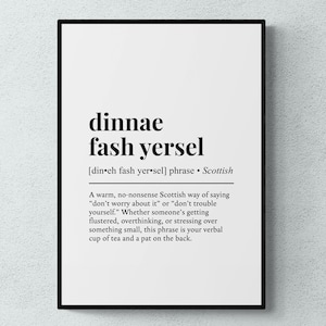May include: A black framed print featuring the Scottish phrase "dinnae fash yersel" in bold black text. The print includes the pronunciation and meaning of the phrase, which translates to "don't worry about it."