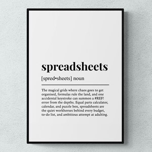 May include: A framed print with the word "spreadsheets" in a bold, black font. The definition below describes spreadsheets as a tool for organization, with a humorous tone. The print is in a black frame.