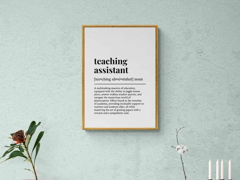 May include: A black and white printable definition of "teaching assistant" with a gold frame. The definition describes a teaching assistant as a multitasking maestro of education.