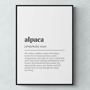May include: A framed print featuring the word "alpaca" with its pronunciation and a description of the animal. The text is black on a white background, suitable for home decor.