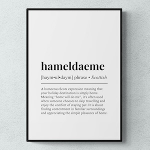 May include: A framed wall print featuring the word hameldaeme in black text on a white background. The text includes the phonetic pronunciation, the origin as a Scottish phrase, and a definition explaining the meaning of staying home.