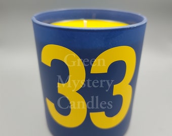 33 (cola scented yellow soy wax candle in blue jar with yellow numbers, a gift for for post apocalyptic gamers)