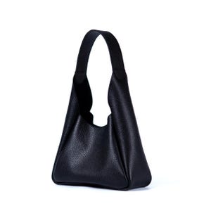Black leather hobo bag with wide strap on white background