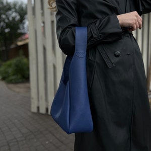 Blue leather hobo bag, handmade shoulder purse with wallet, crafted from natural textured leather, durable and elegant, women’s handbag for daily wear, travel, or gifting occasions.