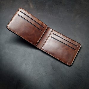 Cartera minimalista plegable con 4 bolsillos para tarjetas independientes