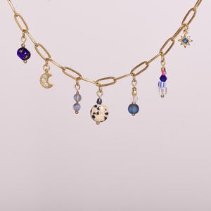 Multicharms necklace with tiny moon