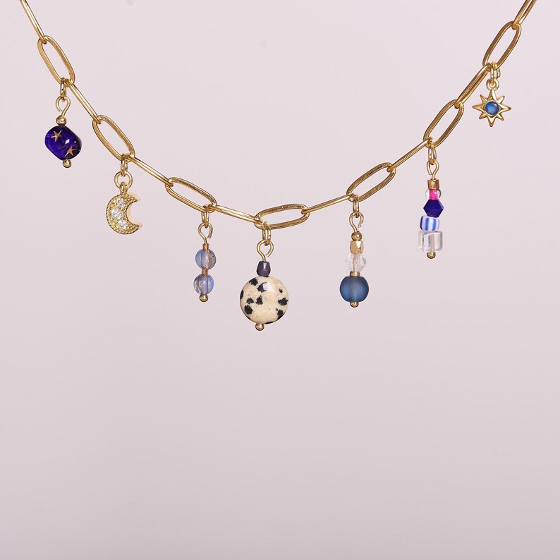 Multicharms necklace with tiny moon