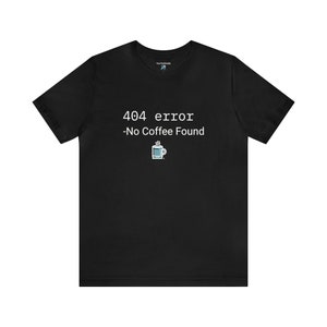 May include: Black t-shirt with white text that reads "404 error -No Coffee Found" and a small icon of a coffee cup with steam coming from it.