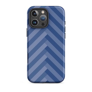 May include: A blue phone case with a chevron pattern. The case has a raised camera bump with three lenses.