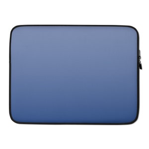 May include: A blue laptop sleeve with a gradient from dark blue to light blue. The sleeve has a zipper on the right side.
