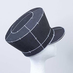 May include: A black hat with a white grid pattern and a brim. The hat is made of a stiff material and has a rounded crown.