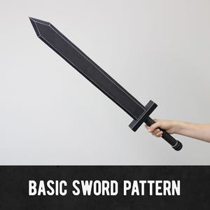May include: A black sword with a rectangular blade and a cross-shaped hilt is held by a person. The sword has a pointed tip and a cylindrical handle. The text "BASIC SWORD PATTERN" is displayed at the bottom of the image.