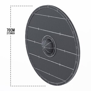 May include: A round, dark gray shield with a diameter of 27.5 inches. The shield has a central boss and is reinforced with metal studs around the edge. Horizontal lines and cross marks are visible on the shield's surface.