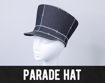 May include: A black parade hat with white lines, worn on a white mannequin head.