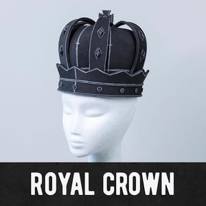 May include: A black royal crown with diamond-shaped accents and a cross-shaped top. The crown is displayed on a white mannequin head. The text "ROYAL CROWN" is displayed in white letters on a black background.