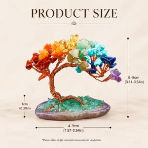 May include: A decorative tree sculpture made of copper wire and colorful gemstones. The tree's branches are adorned with various colored stones, including red, orange, yellow, green, blue, and purple. The base is a polished stone, and the tree measures 3.14-3.54 inches in height.