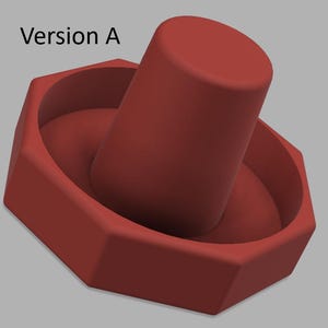 May include: A red bottle stopper with a cylindrical top and a hexagonal base. The stopper is a solid, one-piece design, suitable for sealing bottles. The image is a 3D rendering.