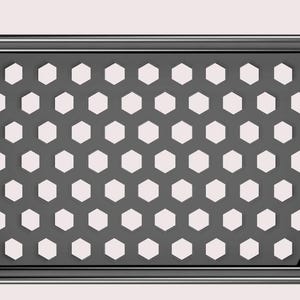 May include: A black, trapezoidal gutter guard featuring a repeating honeycomb pattern of hexagonal cutouts. The frame has a solid border with integrated hook-like brackets on the top left and right corners for secure attachment to a gutter system.
