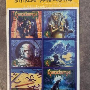 May include: A pack of Goosebumps stickers featuring four different images from the book series. The stickers are on four sheets and feature a mummy, a werewolf, a creature from a tomb, and a notebook with worms.